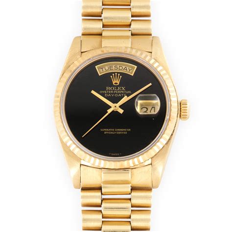 gold rolex onyx dial